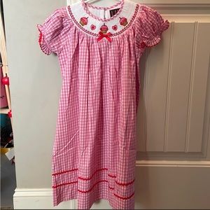 Super cute pink gingham smocked birthday dress